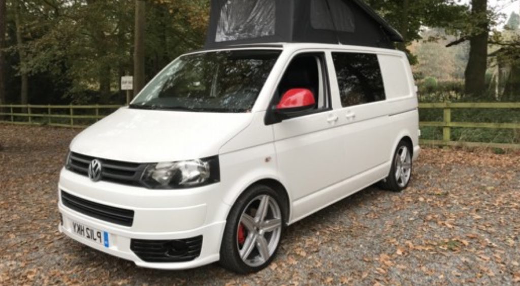 White Campervan with Red Wing mirror detail